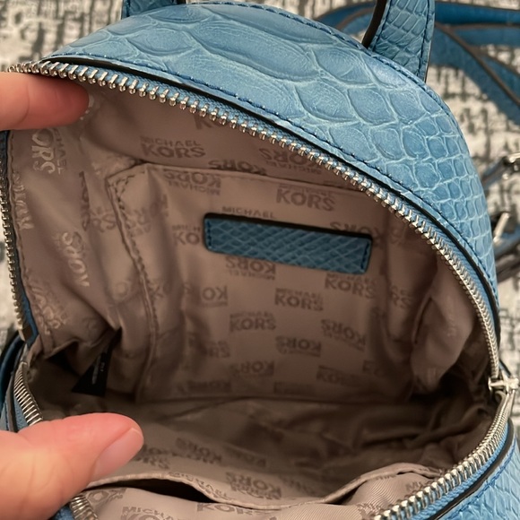 Michael Kors Abbey Extra Small Sky Blue Embossed Leather Backpack Crossbody - Picture 3 of 6